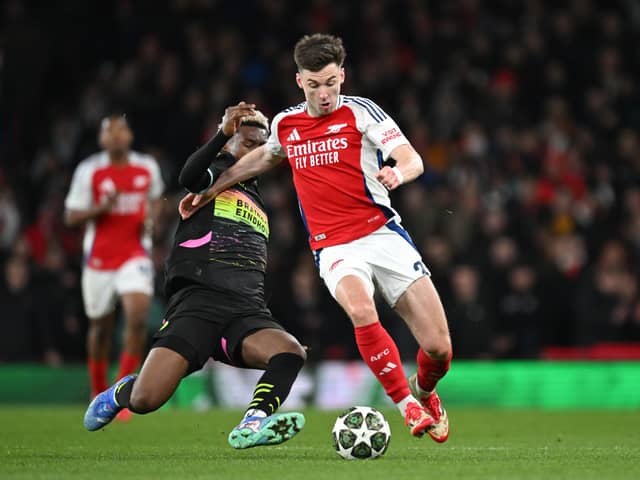 Kieran Tierney of Arsenal is challenged by Adamo Nagalo of PSV Eindhoven during the UEFA Champions League last 16 clash at the Emirates. (Photo by Stuart MacFarlane/Arsenal FC via Getty Images)