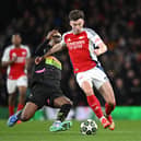 Kieran Tierney of Arsenal is challenged by Adamo Nagalo of PSV Eindhoven during the UEFA Champions League last 16 clash at the Emirates. (Photo by Stuart MacFarlane/Arsenal FC via Getty Images)