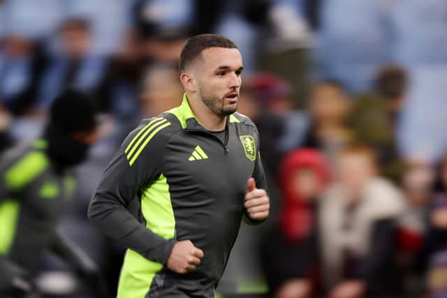 John McGinn warms up ahead of the Champions League tie between Aston Villa and Club Brugge on Wednesday.