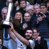 Charles Ollivon of France lifts the Auld Alliance Trophy following the team's victory during the Guinness Six Nations 2024 match between Scotland and France at BT Murrayfield Stadium on February 10, 2024.