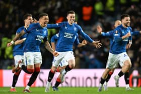 Rangers' Ianis Hagi, James Tavernier, Tom Lawrence and Nicolas Raskin celebrate as they win the penalty shoot-out against Fenerbahce to reach the Europa League quarter-finals. (Photo by Rob Casey / SNS Group)