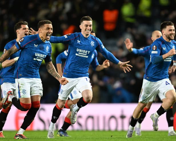 Rangers' Ianis Hagi, James Tavernier, Tom Lawrence and Nicolas Raskin celebrate as they win the penalty shoot-out against Fenerbahce to reach the Europa League quarter-finals. (Photo by Rob Casey / SNS Group)