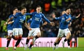 Rangers' Ianis Hagi, James Tavernier, Tom Lawrence and Nicolas Raskin celebrate as they win the penalty shoot-out against Fenerbahce to reach the Europa League quarter-finals. (Photo by Rob Casey / SNS Group)