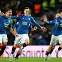 Rangers' Ianis Hagi, James Tavernier, Tom Lawrence and Nicolas Raskin celebrate as they win the penalty shoot-out against Fenerbahce to reach the Europa League quarter-finals. (Photo by Rob Casey / SNS Group)