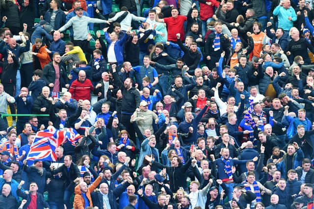 Rangers fans celebrate a goal at Celtic Park in 2019.