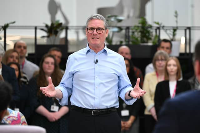 Keir Starmer's decision to scrap arms-length quango NHS England and bring the NHS under democratic control has lessons for the SNP (Picture: Oli Scarff/WPA pool)