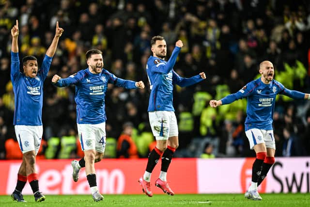 Rangers' Hamza Igamane, Nedim Bajrami, Nicolas Raskin and Vaclav Cerny celebrate as Jack Butland saves the penalty of Dusan Tadic.