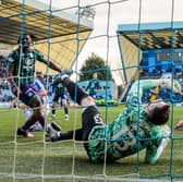 Hibs keeper Jordan Smith despairs after Fraser Murray's effort deflects in.