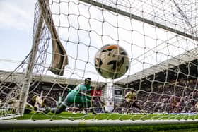Hearts' Jorge Grant scores to make it 2-0.