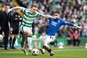 Celtic's Alistair Johnston and Rangers' Nicolas Raskin jostle for possession.  (Photo by Alan Harvey / SNS Group)