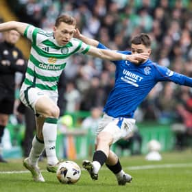Celtic's Alistair Johnston and Rangers' Nicolas Raskin jostle for possession.  (Photo by Alan Harvey / SNS Group)