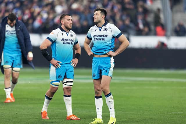 Scotland's Matt Fagerson and Blair Kinghorn reflect on the defeat to France. (Photo by Ross MacDonald / SNS Group)
