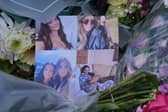 One of many floral tributes left at the house in Bushey, Hertfordshire, where Carol Hunt, 61, and two of her daughters, Hannah, 28, and Louise, 25, were murdered by Kyle Clifford (Picture: Jonathan Brady)