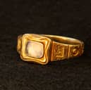A mourning ring engraved with 19th Century Scottish geologist Hugh Miller's name and the date of his birth and death