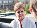 Nicola Sturgeon speaks to the media after announcing she will not stand for re-election to the Scottish Parliament next year (Picture: Robert Perry)