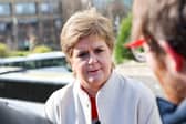 Nicola Sturgeon speaks to the media after announcing she will not stand for re-election to the Scottish Parliament next year (Picture: Robert Perry)