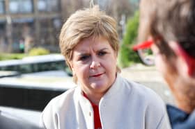 Nicola Sturgeon speaks to the media after announcing she will not stand for re-election to the Scottish Parliament next year (Picture: Robert Perry)