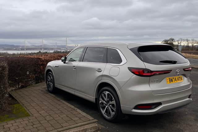 The Rear of the Mazda CX-80 with the Forth Bridges in the  background