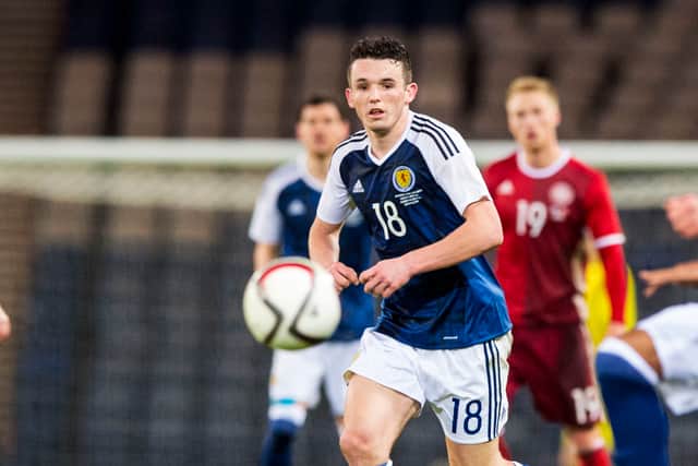 John McGinn wins his first Scotland cap against Denmark in March 2016.