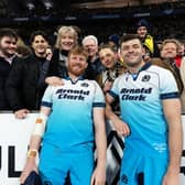Cousins Gregor Brown and Blair Kinghorn with friends and family after they started together for the first time for Scotland, against France in Paris. 