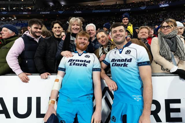 Cousins Gregor Brown and Blair Kinghorn with friends and family after they started together for the first time for Scotland, against France in Paris.