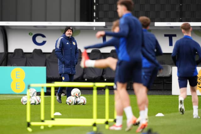 Scotland head coach Steve Clarke (left) watches on during a training session at Lesser Hampden, Glasgow. Picture date: Monday March 17, 2025.
