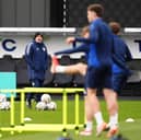 Scotland head coach Steve Clarke (left) watches on during a training session at Lesser Hampden, Glasgow. Picture date: Monday March 17, 2025.