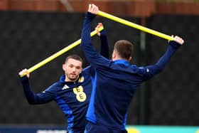 Scotland's John McGinn (left) and team-mate during a training session at Lesser Hampden, Glasgow. Picture date: Monday March 17, 2025.