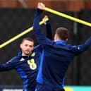 Scotland's John McGinn (left) and team-mate during a training session at Lesser Hampden, Glasgow. Picture date: Monday March 17, 2025.