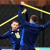 Scotland's John McGinn (left) and team-mate during a training session at Lesser Hampden, Glasgow. Picture date: Monday March 17, 2025.