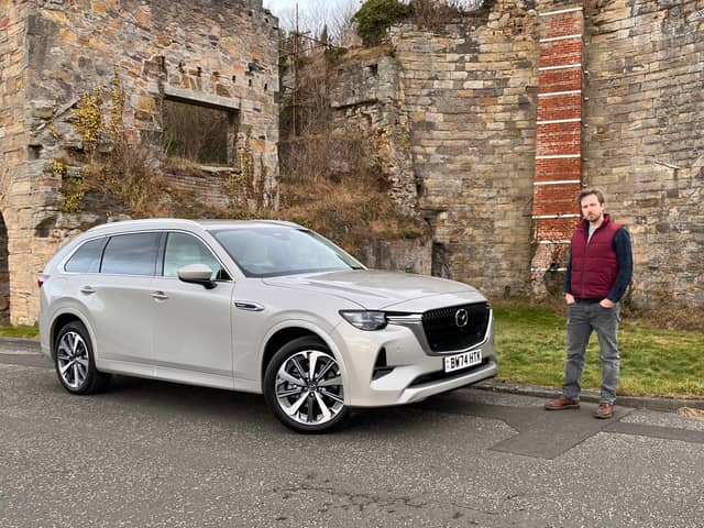 Steven Chisholm with the Mazda CX-80 in Limekilns, Fife