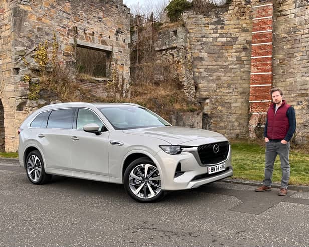 Steven Chisholm with the Mazda CX-80 in Limekilns, Fife