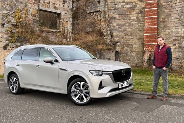 Steven Chisholm with the Mazda CX-80 in Limekilns, Fife