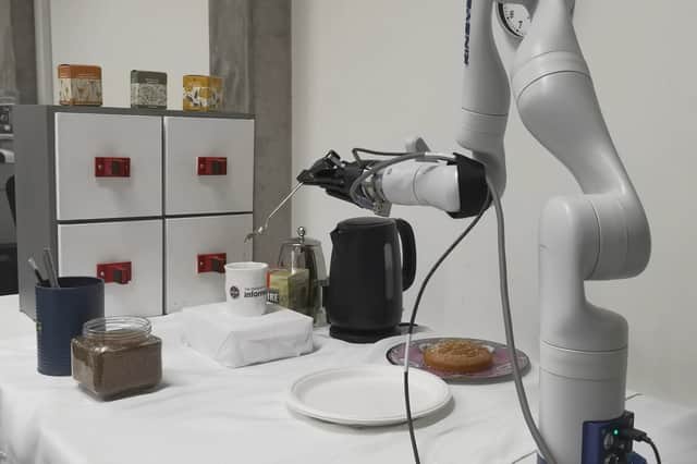 Researchers at University of Edinburgh unveil the world's first AI-powered robot arm capable of making coffee.