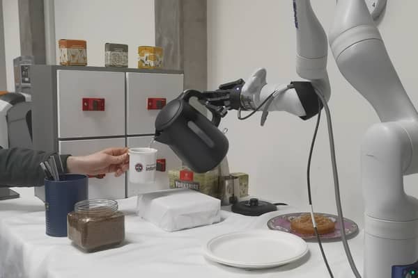 Researchers at the University of Edinburgh unveil the world's first AI-powered robot arm capable of making coffee.