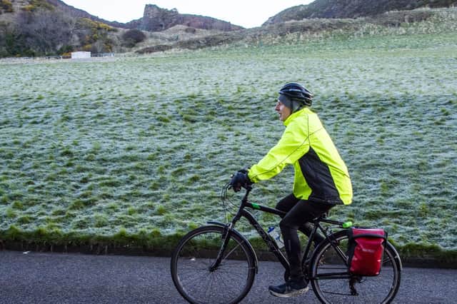 Alastair Dalton rides through a frosty Holyrood Park during the Edinburgh Dawn Patrol on Tuesday