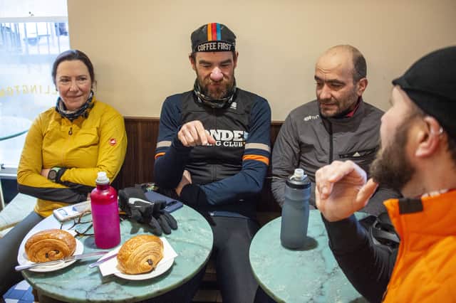 Riders enjoying coffee and pastries after Tuesday's Edinburgh Dawn Patrol