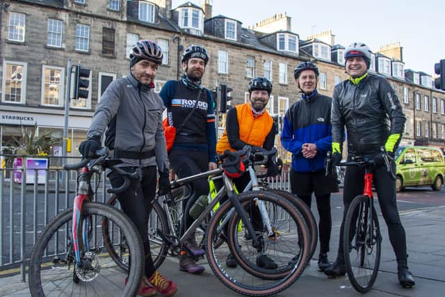 Markus Stitz, left, with some of the fellow riders after the Edinburgh Dawn Patrol cycle on Tuesday