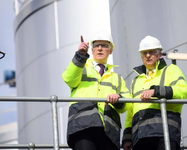 John Swinney, left, speaks to Mark Simmers, chief executive of biorefinery Celtic Renewables, during a visit to the Grangemouth plant (Picture: WPA pool)