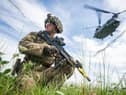 The UK needs to increase its defence capabilities, but it's wrong to cut benefits to do so (Picture: Leon Neal)