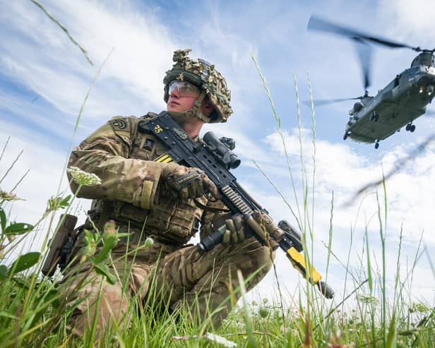 The UK needs to increase its defence capabilities, but it's wrong to cut benefits to do so (Picture: Leon Neal)