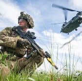 The UK needs to increase its defence capabilities, but it's wrong to cut benefits to do so (Picture: Leon Neal)