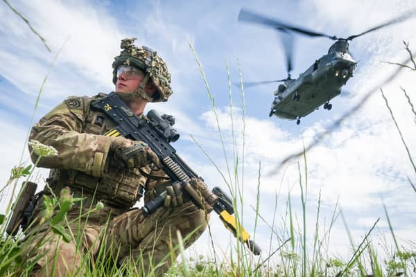 The UK needs to increase its defence capabilities, but it's wrong to cut benefits to do so (Picture: Leon Neal)