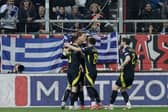 Scotland's Scott McTominay celebrates with teammates after scoring the opening goal during the Nations League play off first leg game against Greece. Cr: AP