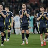 Scotland players greet fans at the end of the Nations League play off first leg win over Greece. (AP Photo/Petros Giannakouris)