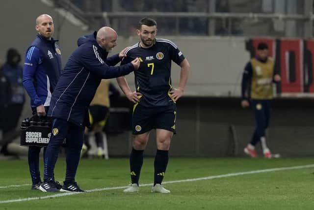 Scotland head coach Steve Clarke, left, gives instructions to John McGinn during the Nations League play off first leg win over Greece. (AP Photo/Petros Giannakouris)