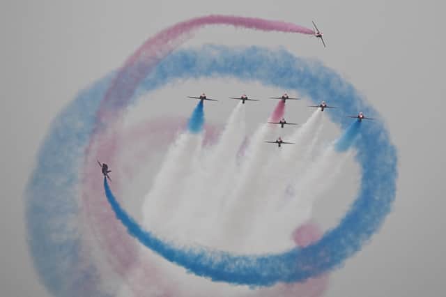 Given the seriousness of our times, it may not be possible to retain the RAF Red Arrows display team, seen performing over Athens last year (Picture: Theophile Bloudanis)