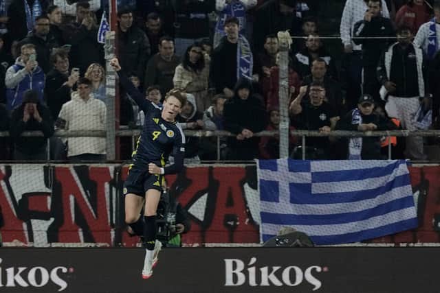 Scott McTominay celebrates his winning penalty vs Greece in Thursday's night Nations League playoff win in Piraeus. Cr: AP.