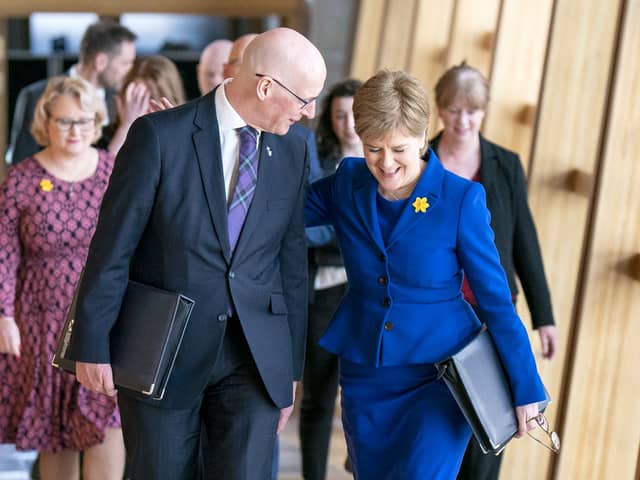 John Swinney and Nicola Sturgeon pictured in Holyrood in 2023