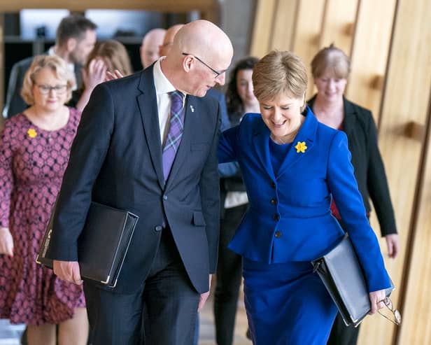 John Swinney and Nicola Sturgeon pictured in Holyrood in 2023